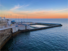 The Swimming Pool by the Sea by Jeff Moore
