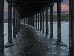 Under Whitby Pier by Jeff Moore